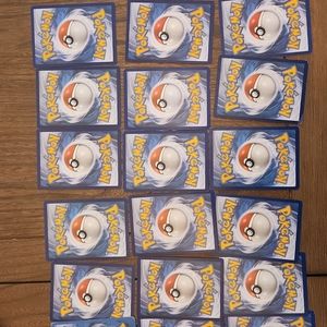30 randum pokemon cards and 5 energy cards